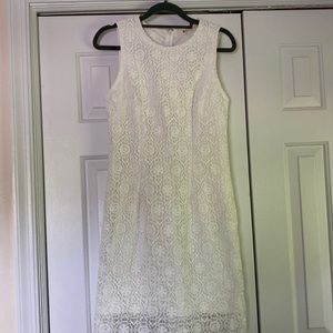 White form-fitting lace dress